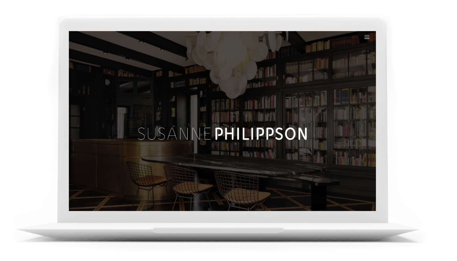 Laptopansicht unserer Webdesign Referenz Susanne Philippson mit hochwertigem Innenarchitekturfoto